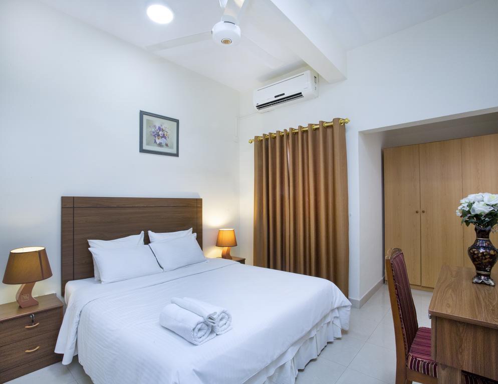 Nuzha Hotel Apartments Маскат Экстерьер фото